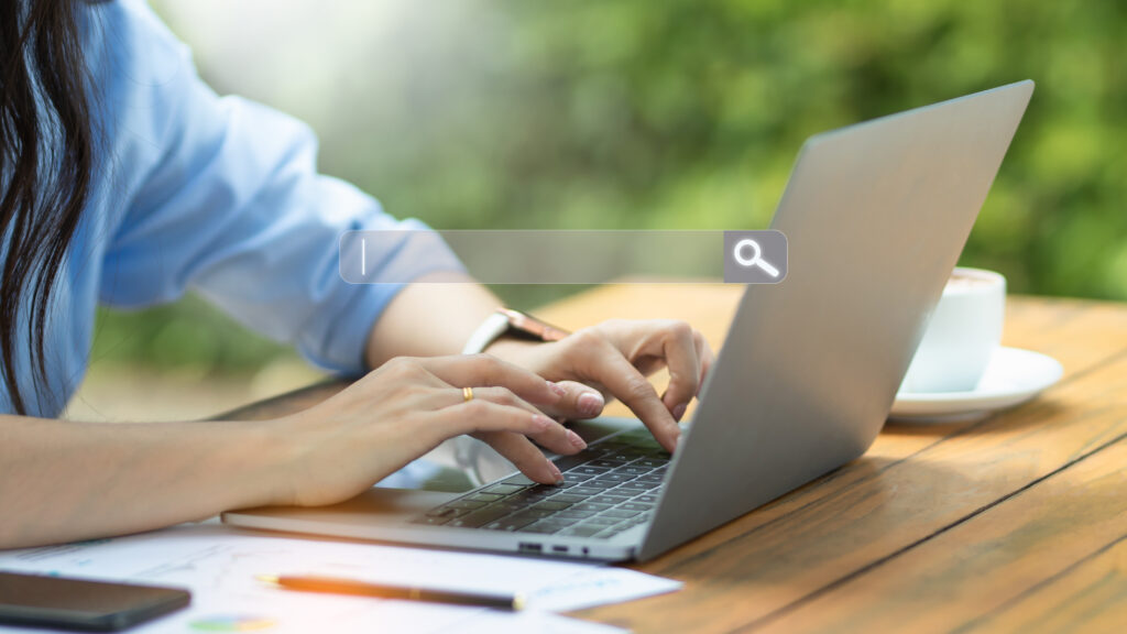 Up close with business women working with smartphones and laptop